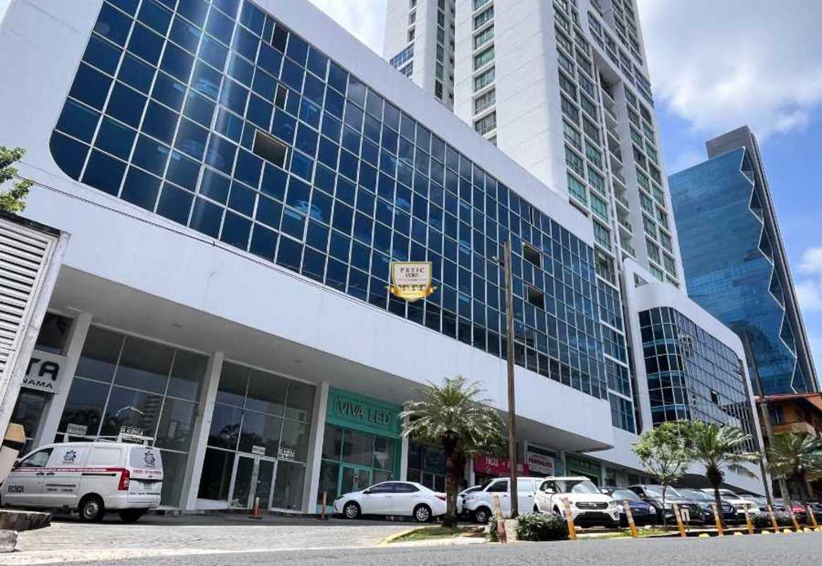 Living room with large windows and ocean view PH The Seawaves Bella Vista Panama