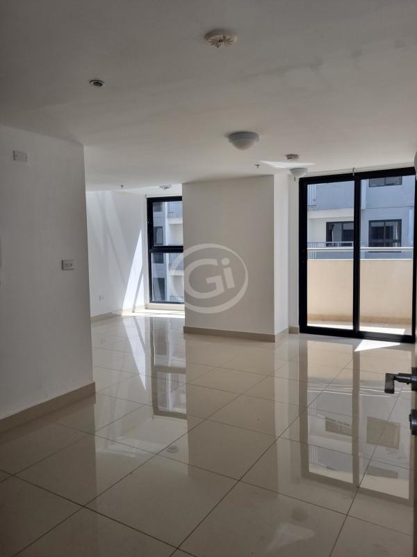 Bright living room with large windows and balcony in PH Worldwide Plaza in Obarrio Panama
