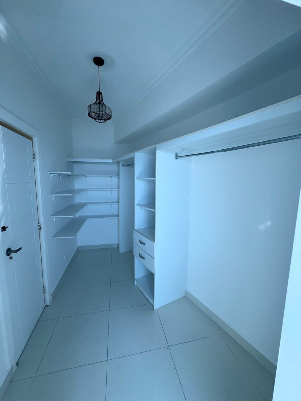 Contemporary bathroom with glass shower door, vanity and ocean view PH Nautica Panama