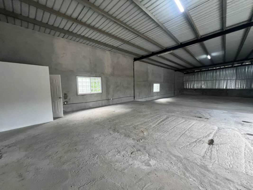 Large industrial logistics park aerial showing warehouses and truck bays in Tocumen Panama