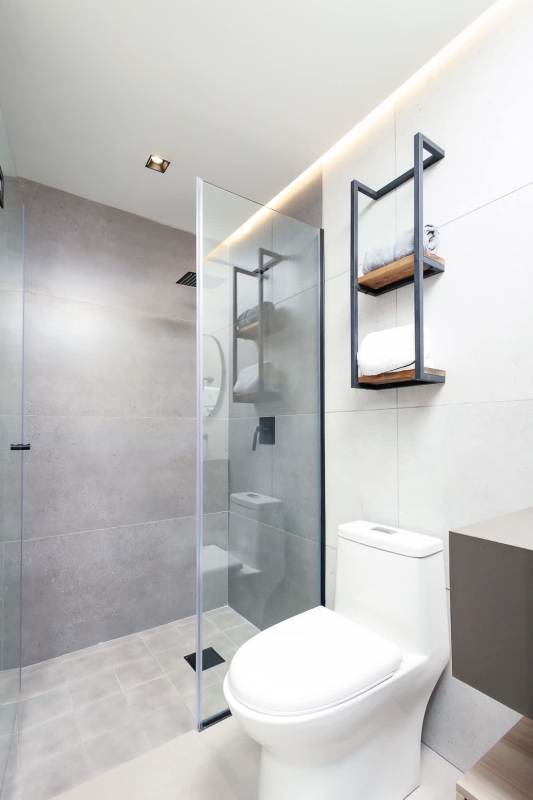 Walk-in glass shower modern minimalist design Uptown Marbella condo Panama