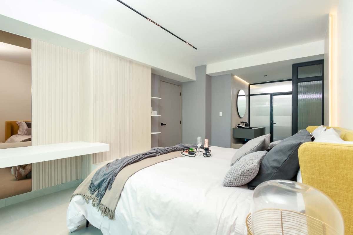 Modern bedroom design with yellow accents Uptown Marbella Residences Panama