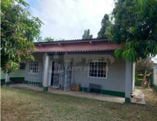 Single-story house with covered porch and greenery in Nueva Gorgona Panama
