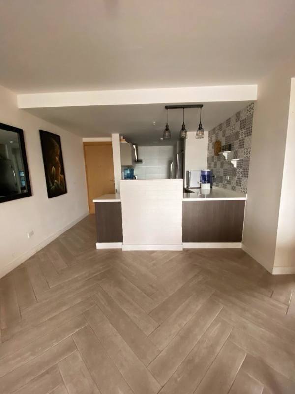 Kitchen with breakfast bar, mosaic backsplash, pendant lighting, stainless steel appliances in PH El Carmen Panama City