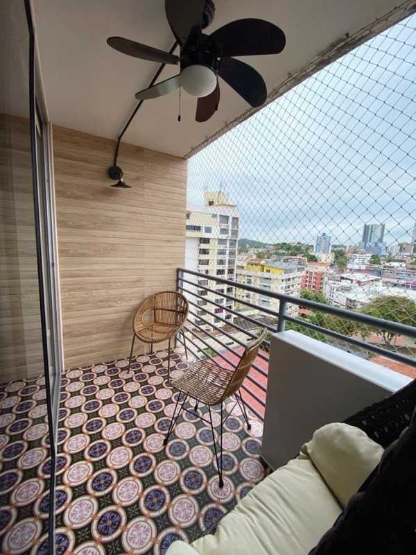 Balcony with patterned tiles, ceiling fan, safety netting, and city skyline views PH El Carmen Tower Panama