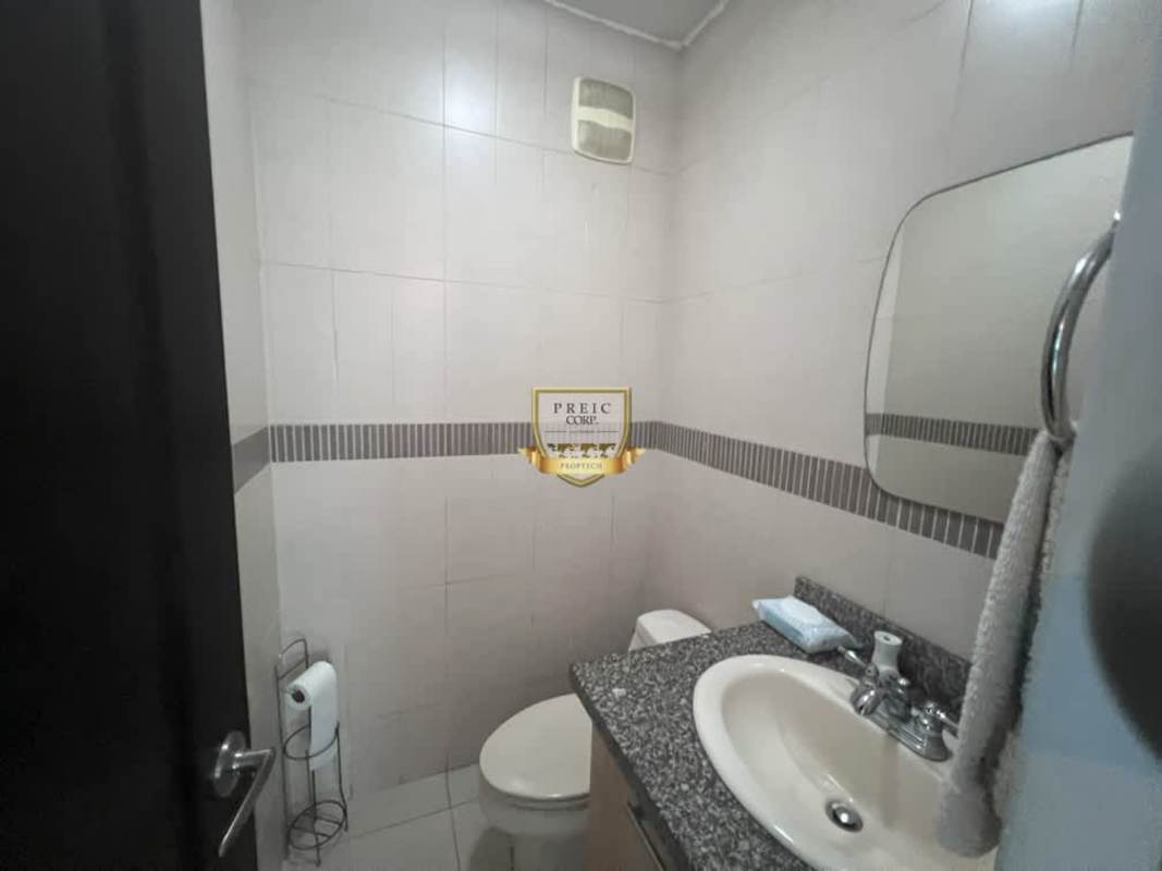 Spacious bathroom with double sink, walk-in shower at PH Titanium Tower Panama