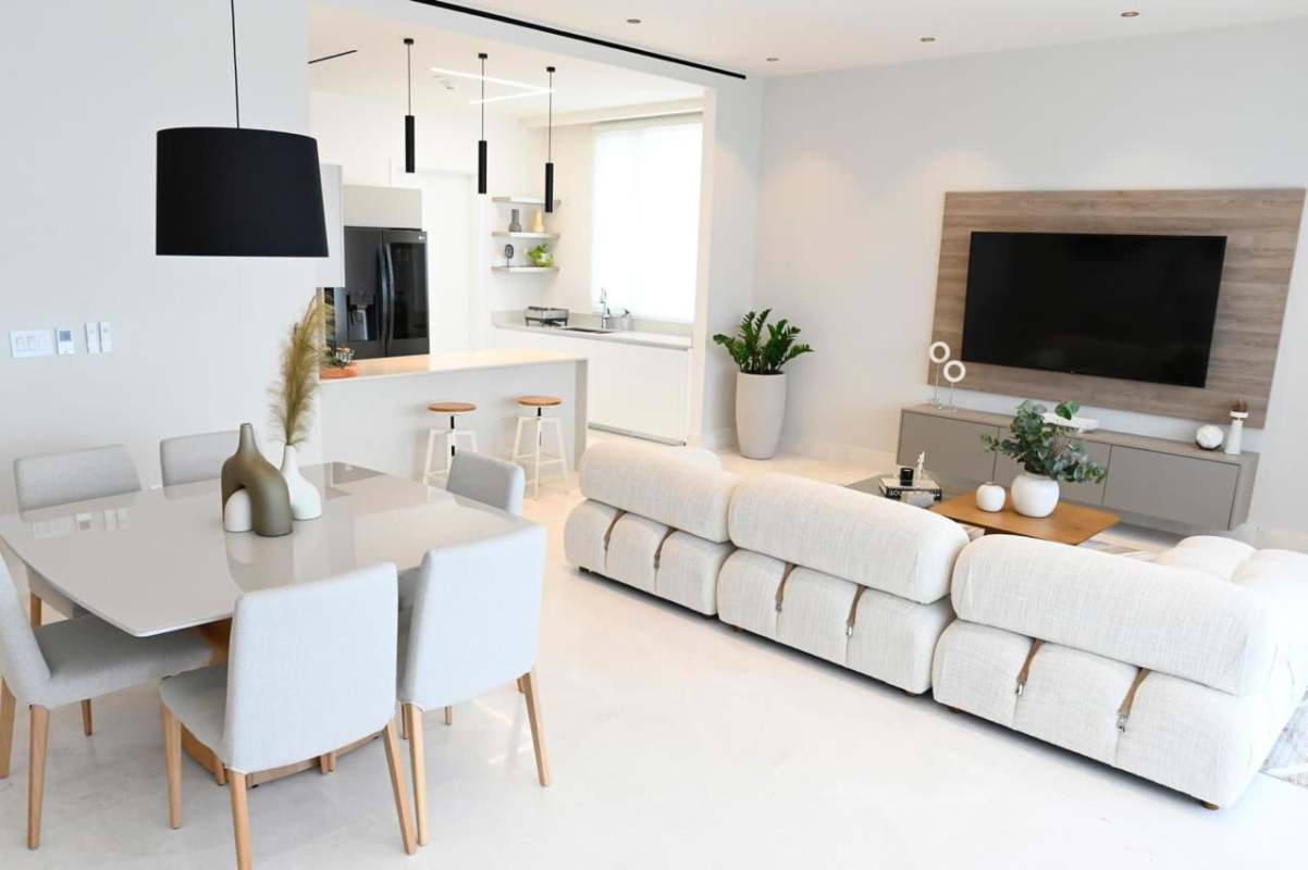 Bright luxurious living room with marina views furnishings Ocean Reef Islands Panama City