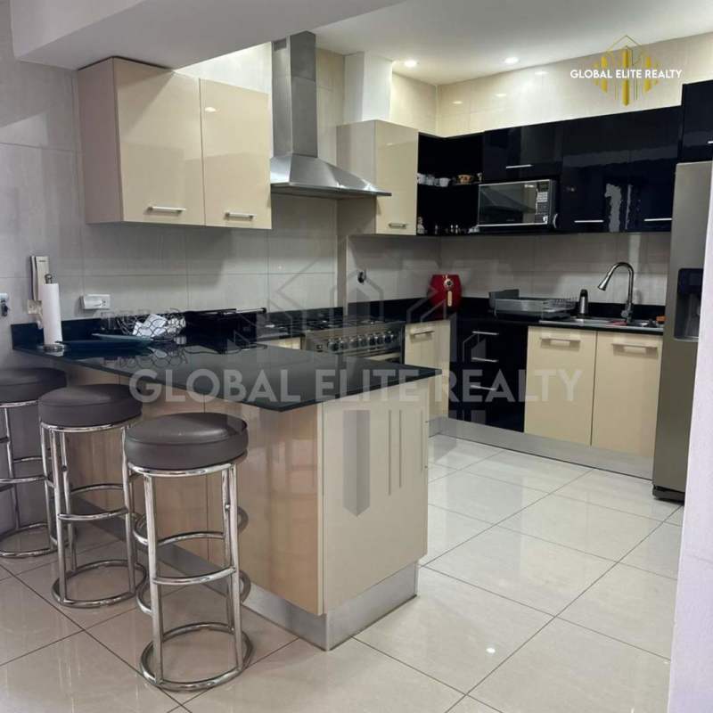 Bedroom with large windows, modern decor, private bath and ocean views at PH Bella Vista Residences Panama