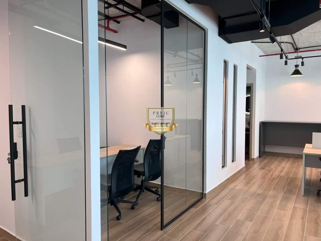 Fully furnished office with glass walls open workspace city view in Panama Costa del Este