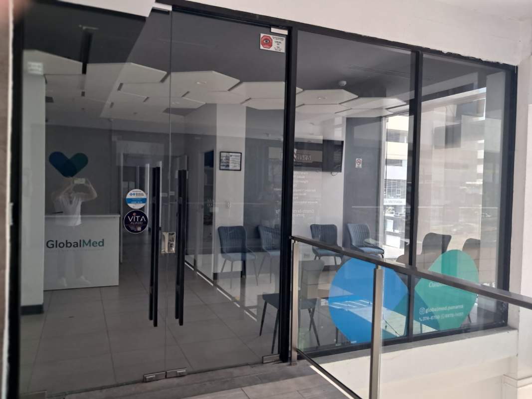 Reception desk leading to consultation rooms inside commercial medical clinic Plaza Liberty Panama