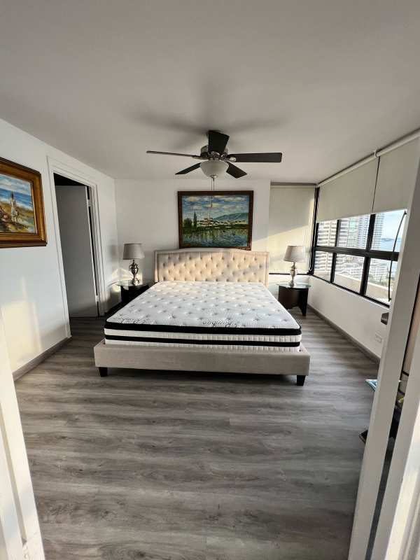 Bedroom with panoramic ocean views, ceiling fan and AC in PH BICSA Tower Panama