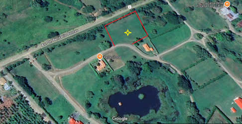 Gated entrance with palm trees at Equus Village Pedasi Panama