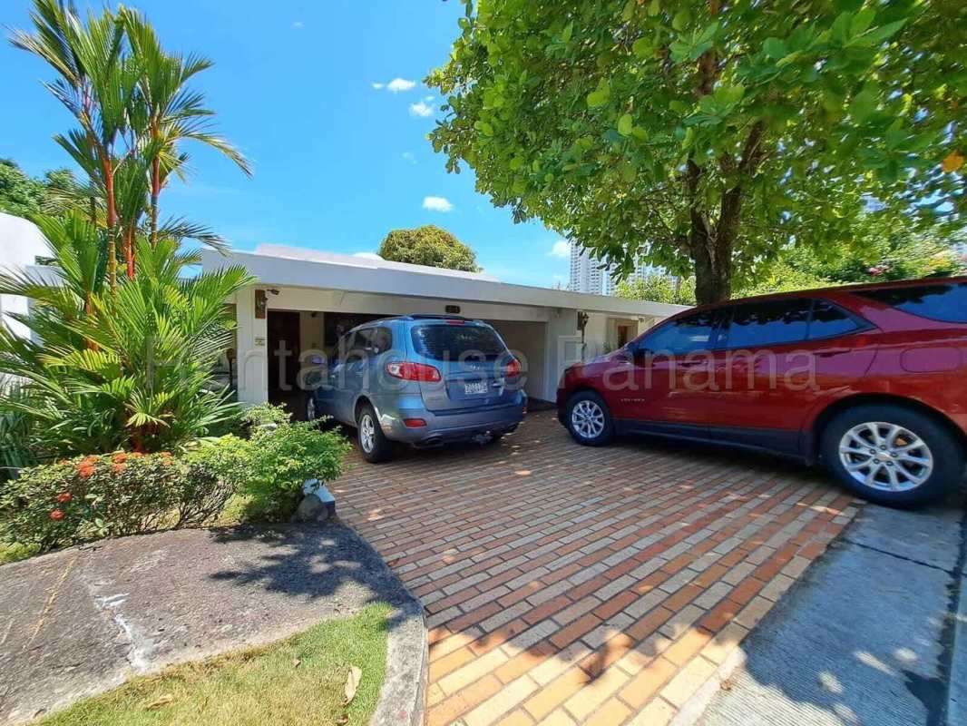 Traditional wood-beam ceiling dining room in Betania house Panama City