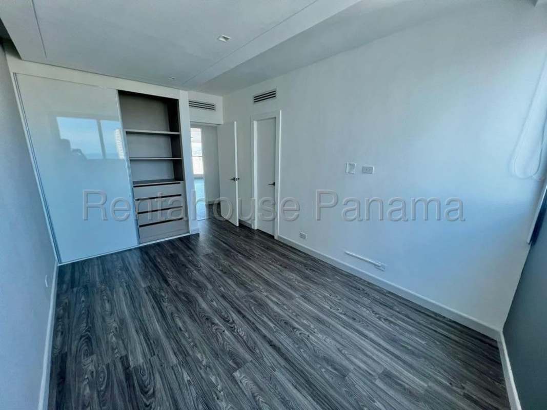Modern spacious living room floor to ceiling windows city and ocean view PH Serenade San Francisco Panama
