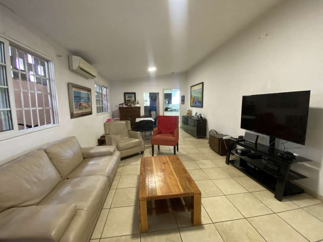 Front exterior with electric gate driveway and garden Brisas del Golf Panama