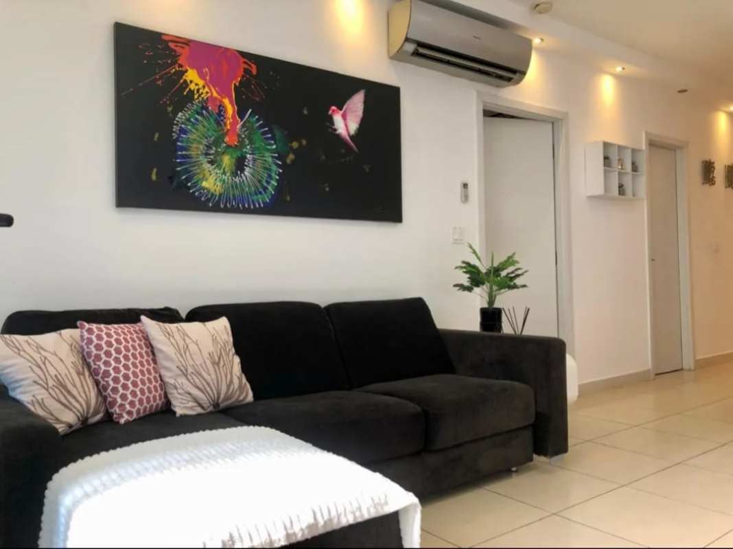 Open dining space with modern kitchen appliances in Punta Pacifica Panama City PH Oasis