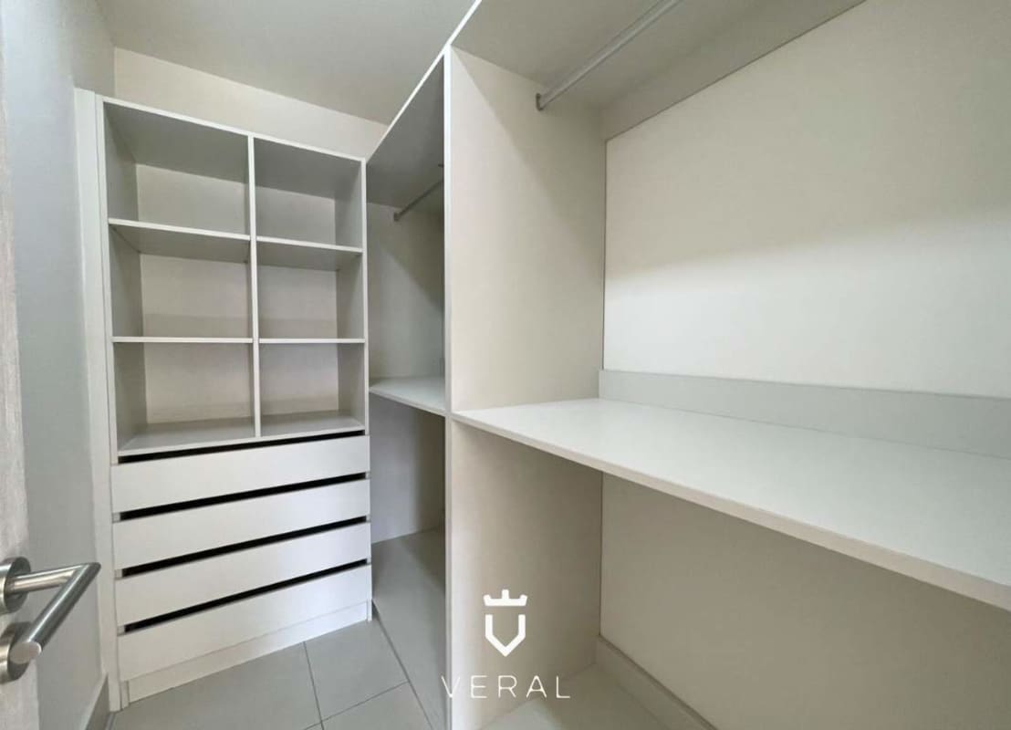 Spacious walk-in closet with built-in organizers in PH Coco Place Panama