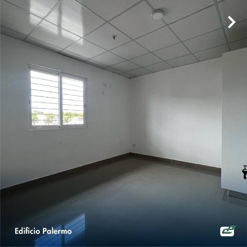 Interior hallway with black doors, white walls, ceramic floor tiles in Edificio Palermo El Ingenio Panama City