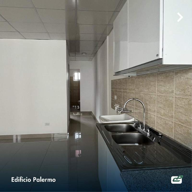 Compact kitchen with double sink, white cabinets and tiled backsplash Edificio Palermo El Ingenio Panama