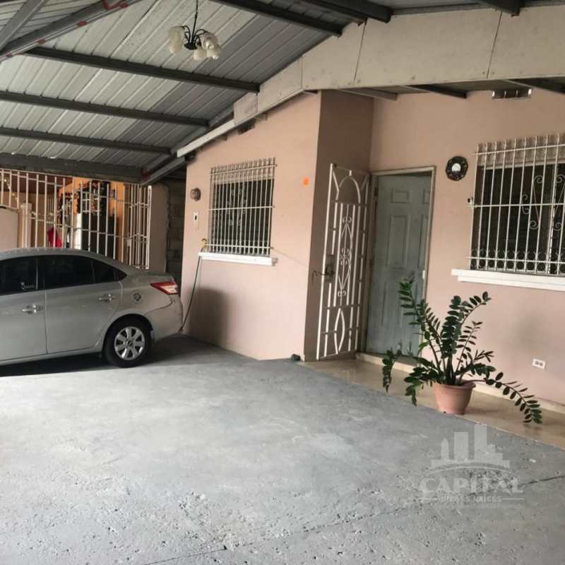 Living room dining space with ceramic floors in affordable Villa Belén house Panama
