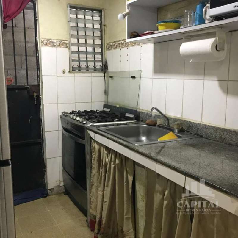 Side exterior wall and entrance Villa Belén affordable house for sale Panama