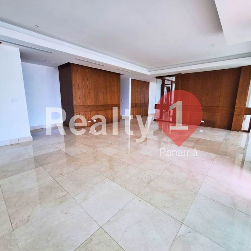 Luxury apartment living area with marble tile and panoramic city skyline view in PH Aria Costa del Este