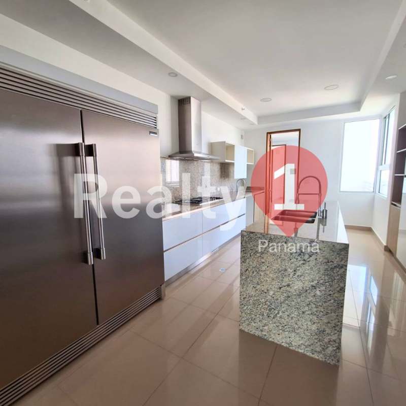 Modern luxury bathroom with double marble vanity, glass shower enclosure and large mirror in Costa del Este Panama