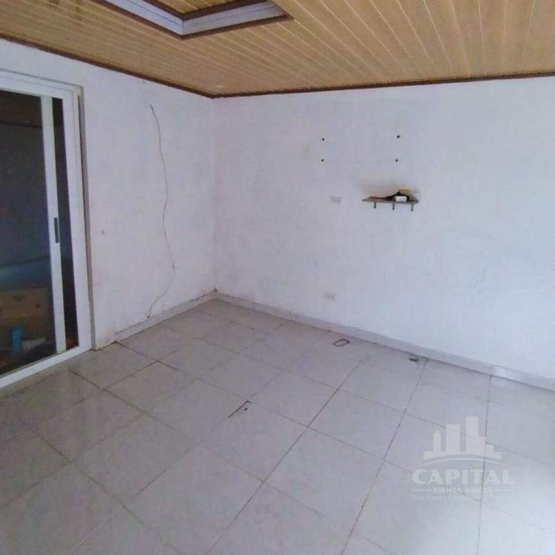 Cozy living room with tiled floors and entertainment area in San Antonio Panama City house