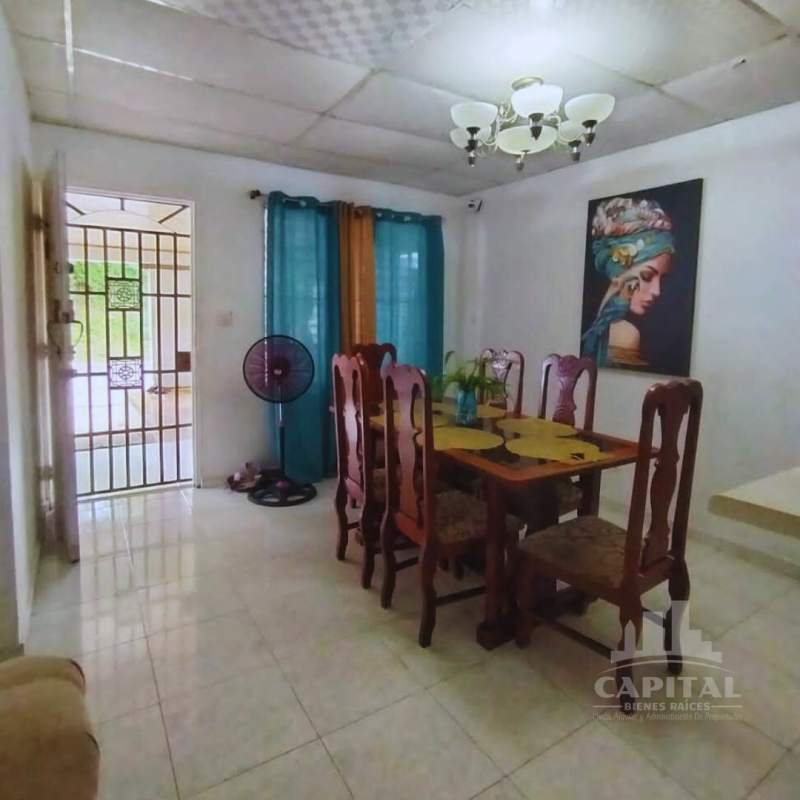 Enclosed patio terrace with wood style ceiling and wide windows in residential house Brisas del Golf Panama