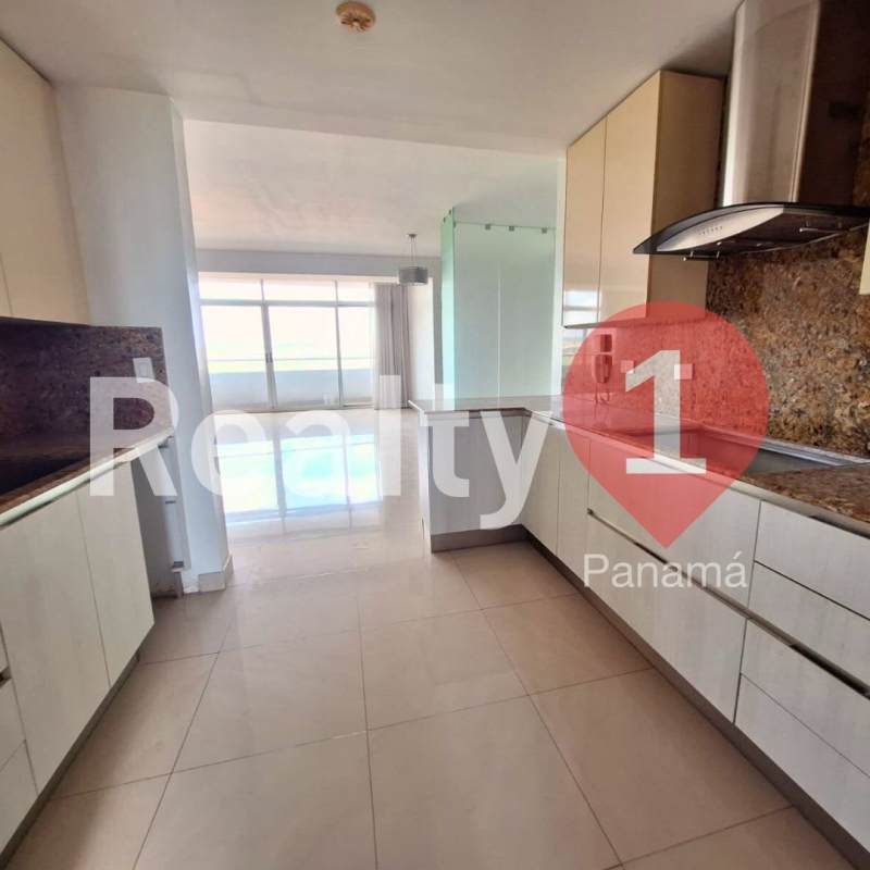 Infinity pool with sun deck overlooking ocean skyline in PH Elevation Costa del Este Panama