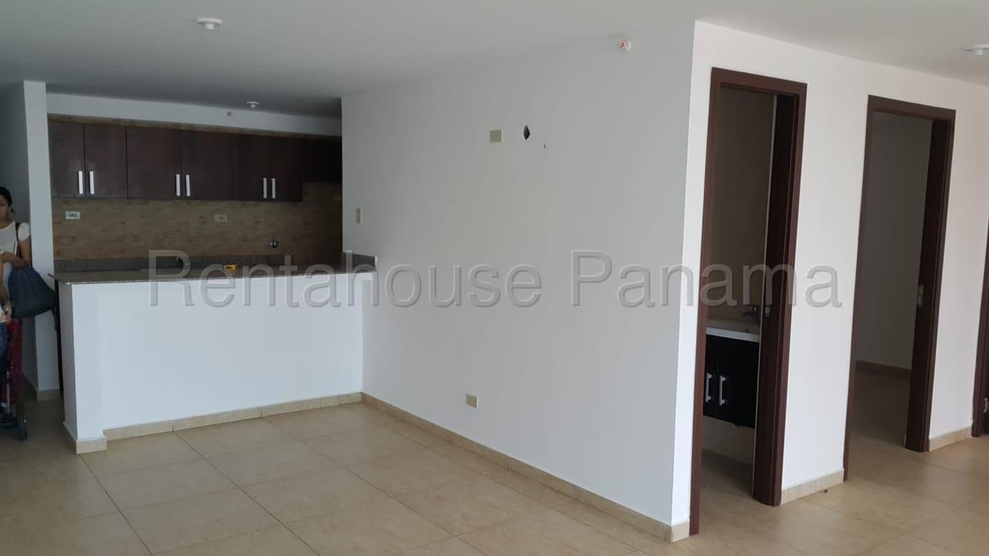 Living and dining space with balcony window PH Condado Country Club Condado del Rey Panama City