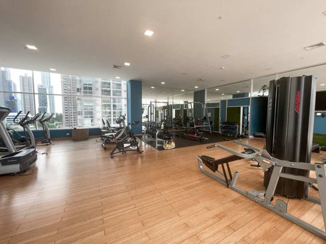 Private balcony with panoramic ocean and city skyline views at PH Top Tower Costa del Este Panama for rent