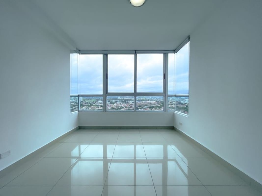 Spacious bedroom with closet space, split AC, floor-to-ceiling windows at PH Top Tower Costa del Este Panama