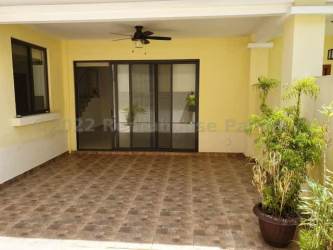 Private covered terrace and garden in River Valley Panama Pacifico home