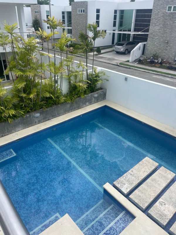 Private backyard pool with patio area in Costa Sur Panama house for sale