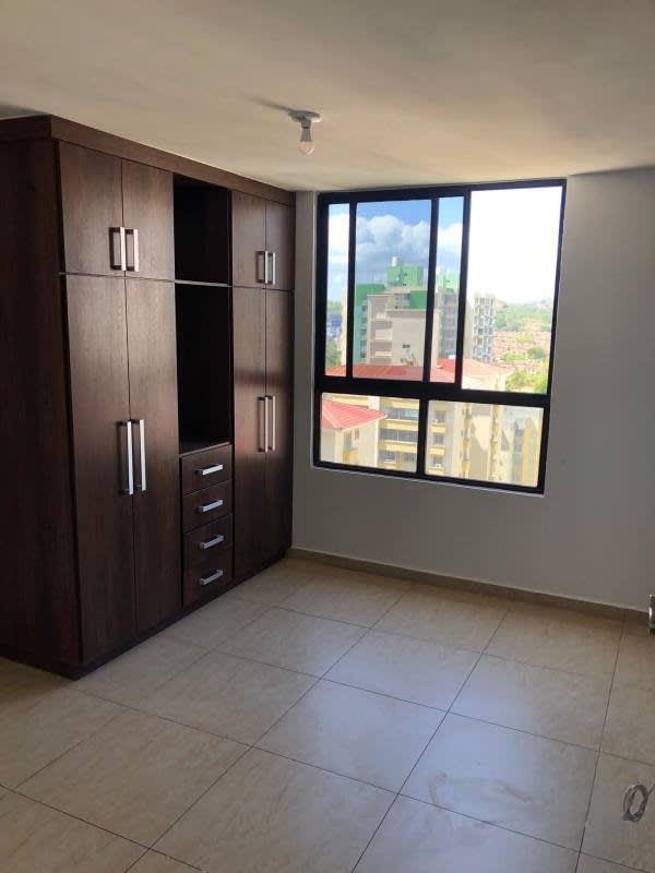 Open kitchen with granite countertops and appliances PH Condado Country Club Panama Panama City