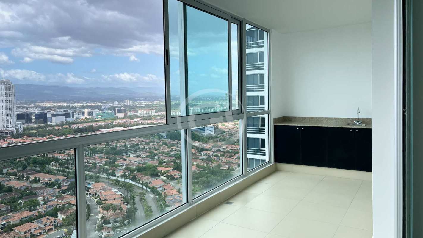 Enclosed balcony with panoramic ocean skyline views in PH Breeze Costa del Este Panama City