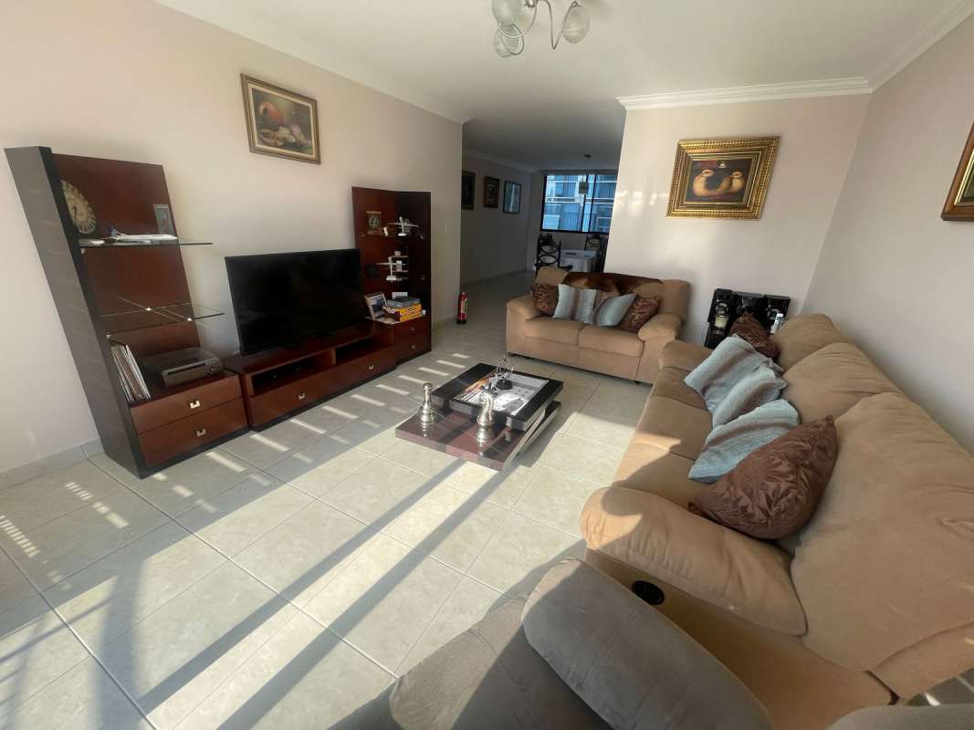 Dining room in modern apartment at PH Lexus San Francisco Panama with open layout