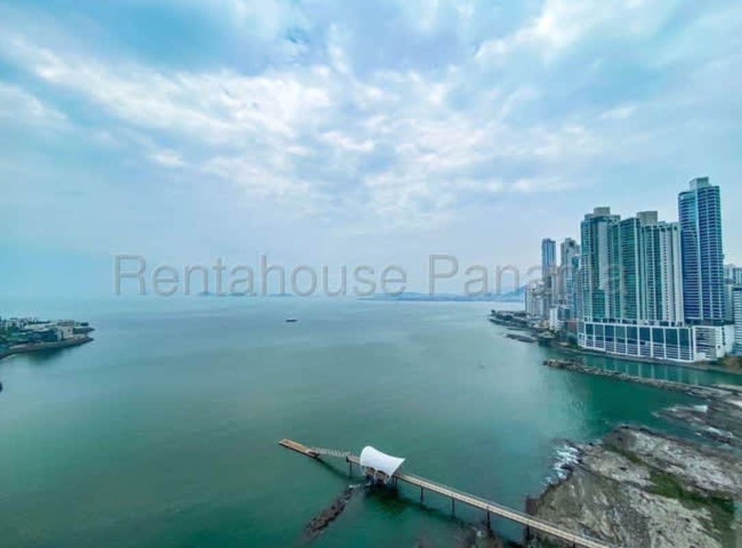 Spacious modern kitchen with granite counters and island at PH Aquamare in Punta Pacifica Panama City