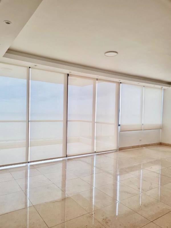 Laundry room with appliances and maid's quarters at PH Dal Mare luxury condo Panama City