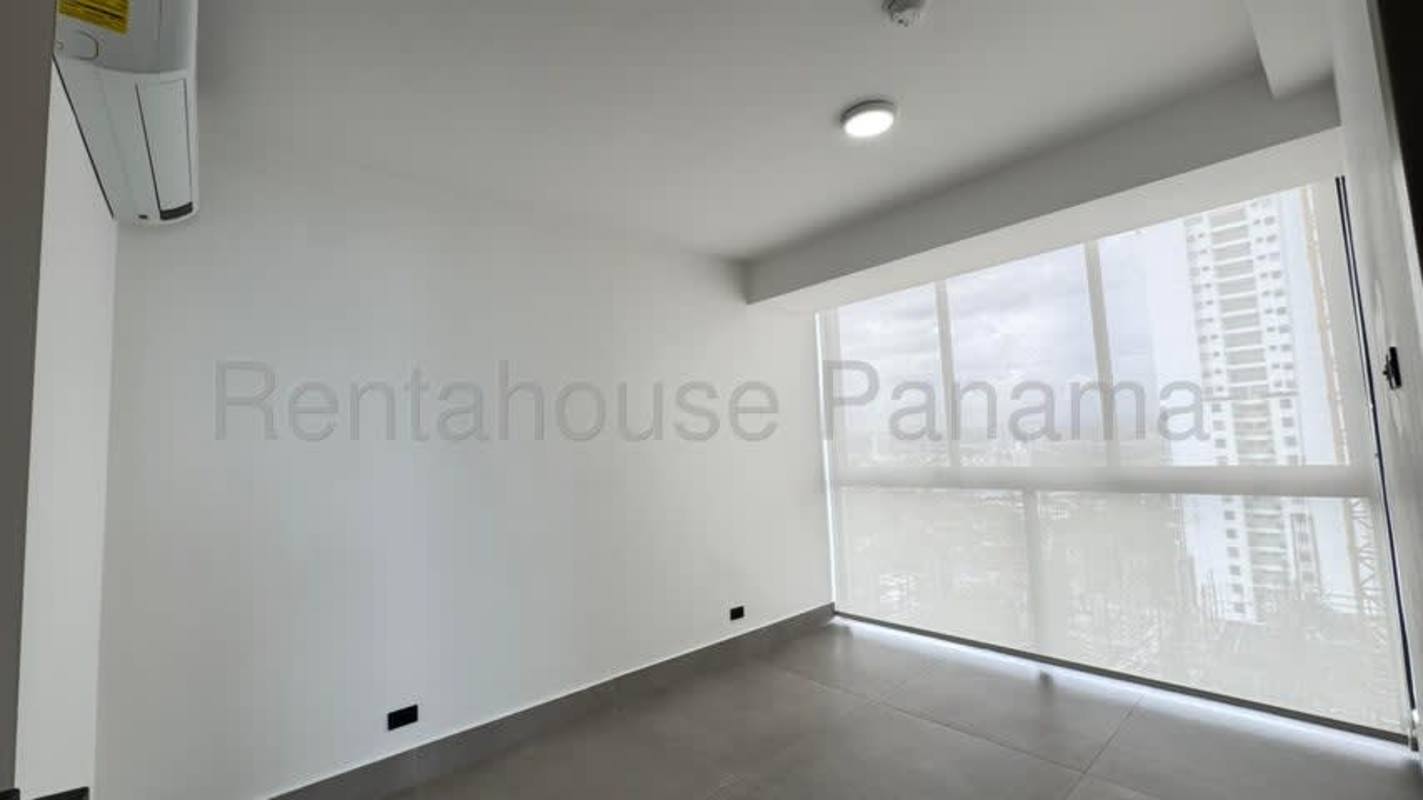 Glass railing balcony with panoramic ocean and skyline views from PH Victory Wellness Panama City