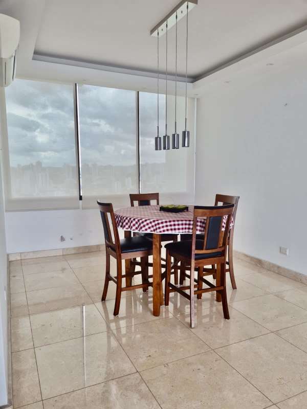 Modern dining room with floor-to-ceiling windows and ocean view in PH Dal Mare Coco del Mar Panama