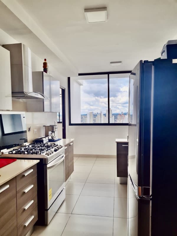 Spacious walk-in closet with built-in organizers inside PH Dal Mare Coco del Mar luxury condo