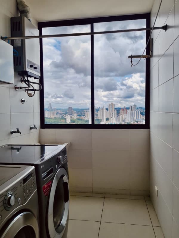 Laundry room with washer dryer hookups inside PH Dal Mare luxury condo Coco del Mar