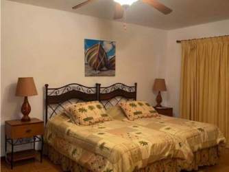 Outdoor tropical style patio with swimming pool and hot tub at Costa Blanca Villa Royal Decameron Panama