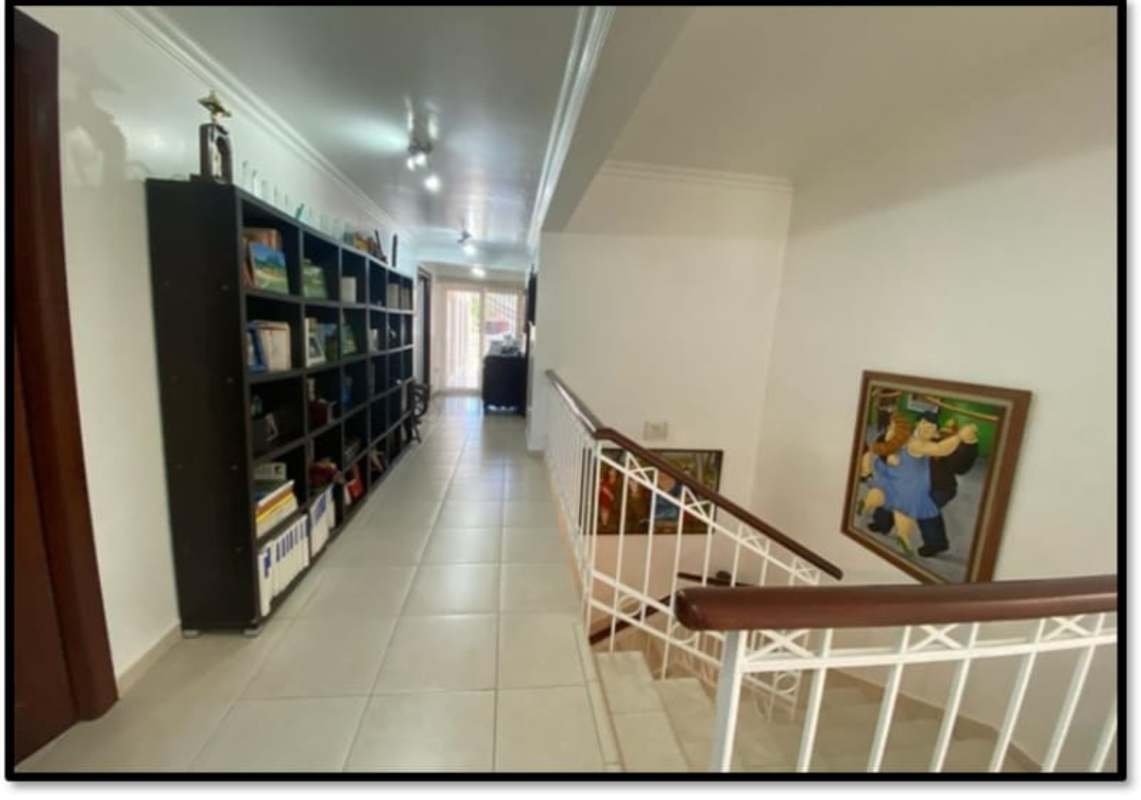 Spacious living room with sofas, accent chairs, modern and traditional decor in Clayton Panama