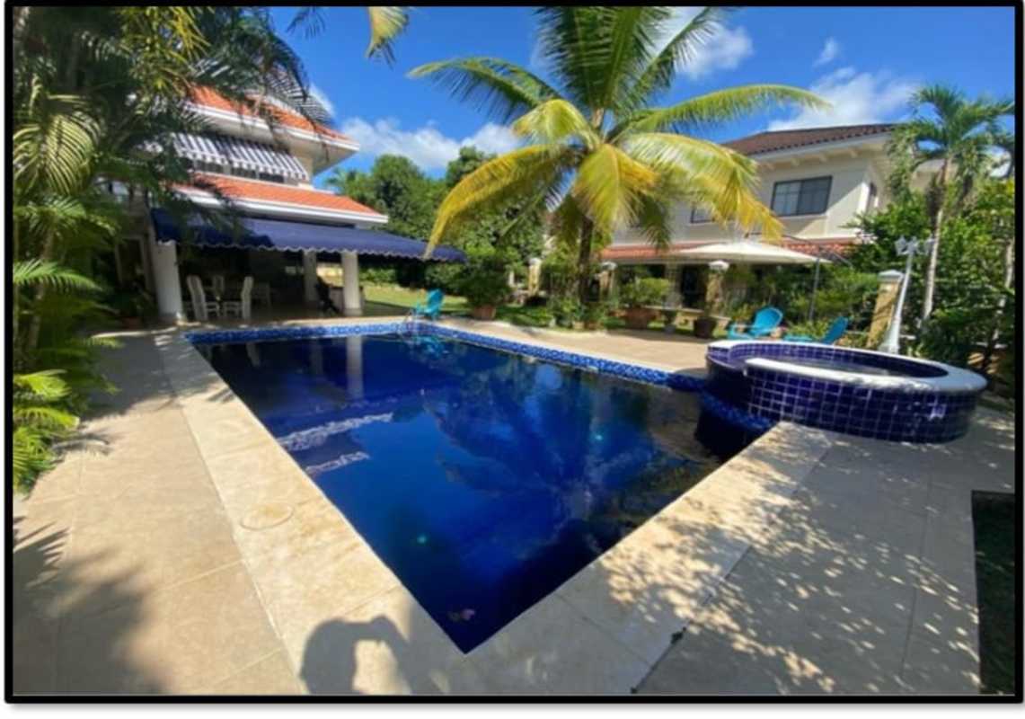 Bright home office or study area on loft overlooking garden in Clayton Panama luxury home