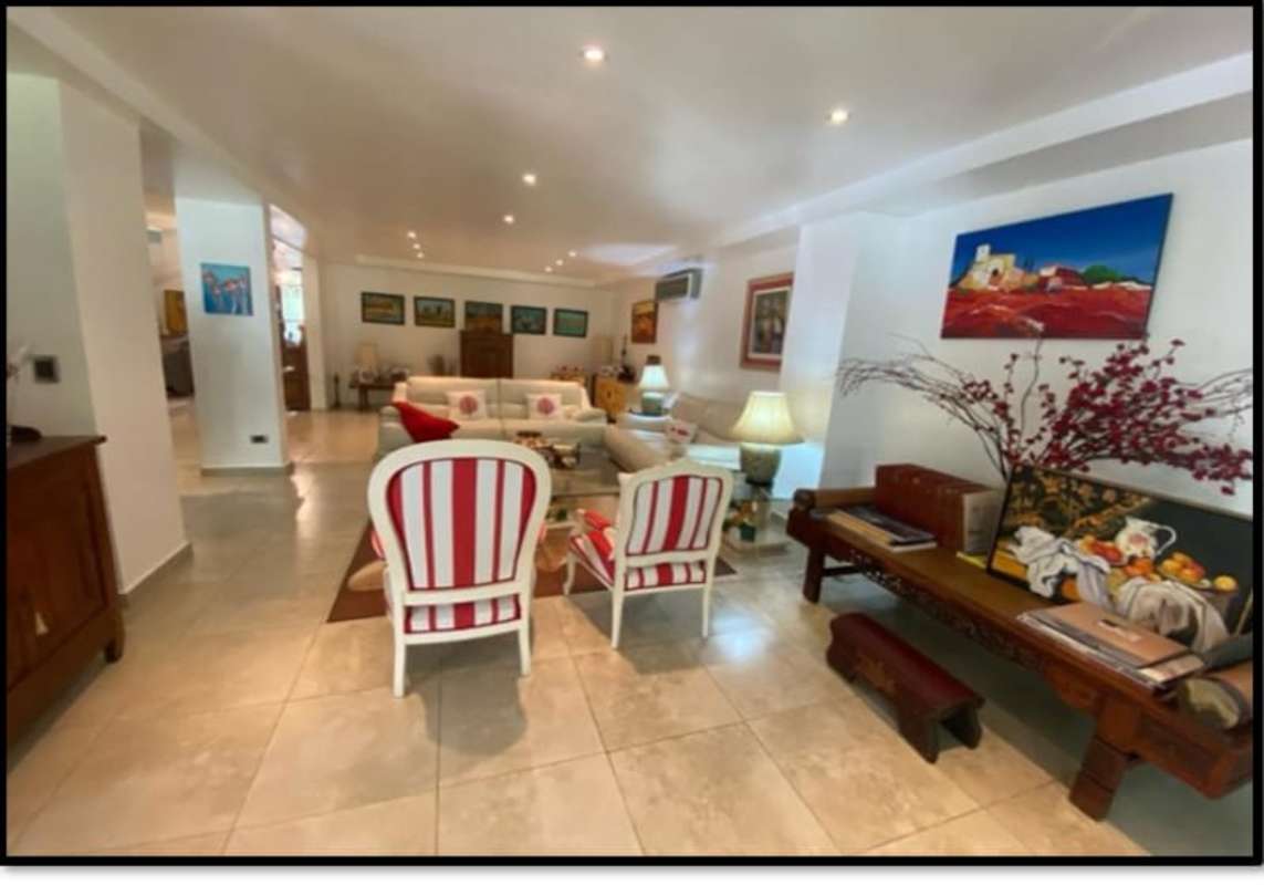 Dining room with large windows, high ceiling and contemporary furniture in Clayton luxury house Panama