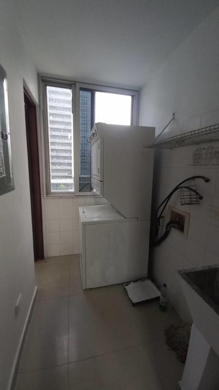 Bedroom with balcony, ceiling fan, partial ocean view PH Parque Balboa Bella Vista Panama