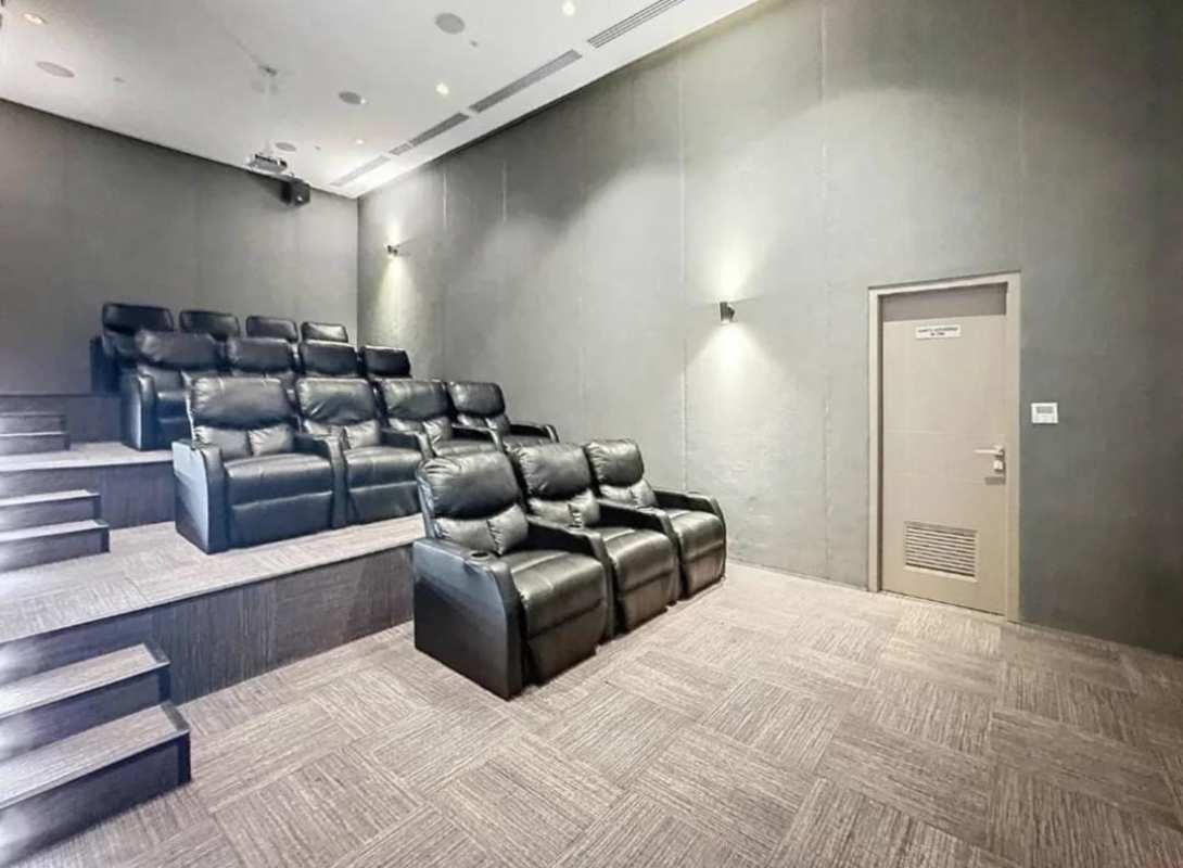 Private home theater with recliner chairs inside PH Urbana condominium Obarrio Panama City